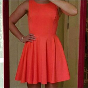 Neon orange cut outs dress